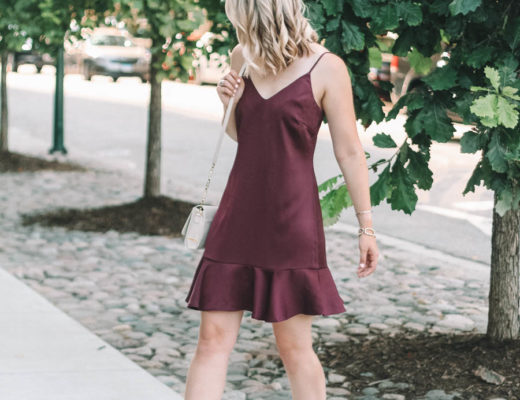 Maroon flare dress and neutral heels on Champagne and Blue Jeans a Raleigh Style blogger